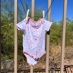 Bebe Baby Girl’s Onesie Size 0-3 Mos Color White, Pink W/Paint Looking Spots)